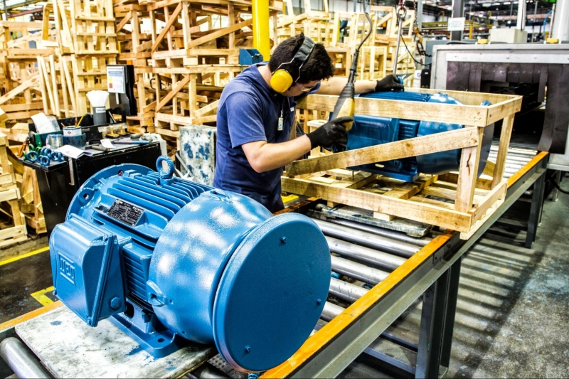 Large electric motors ready for installation in an industrial facility, supporting reliable motor selection and uptime.