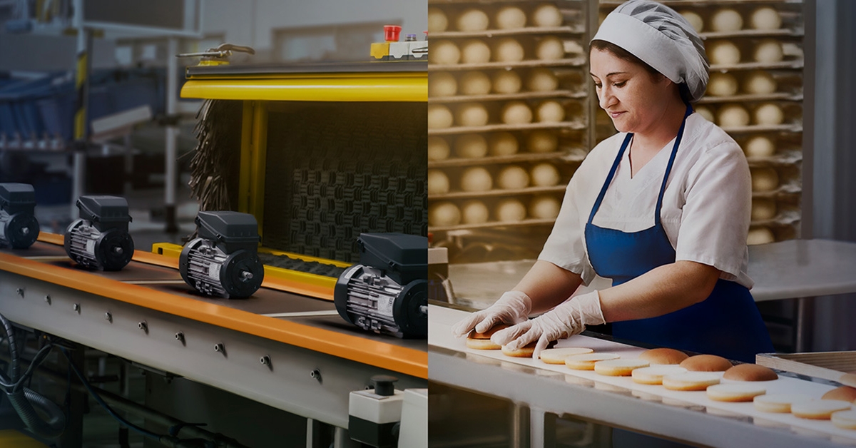 Electric motors powering a food production conveyor line next to a worker assembling baked goods in a hygienic food processing facility.