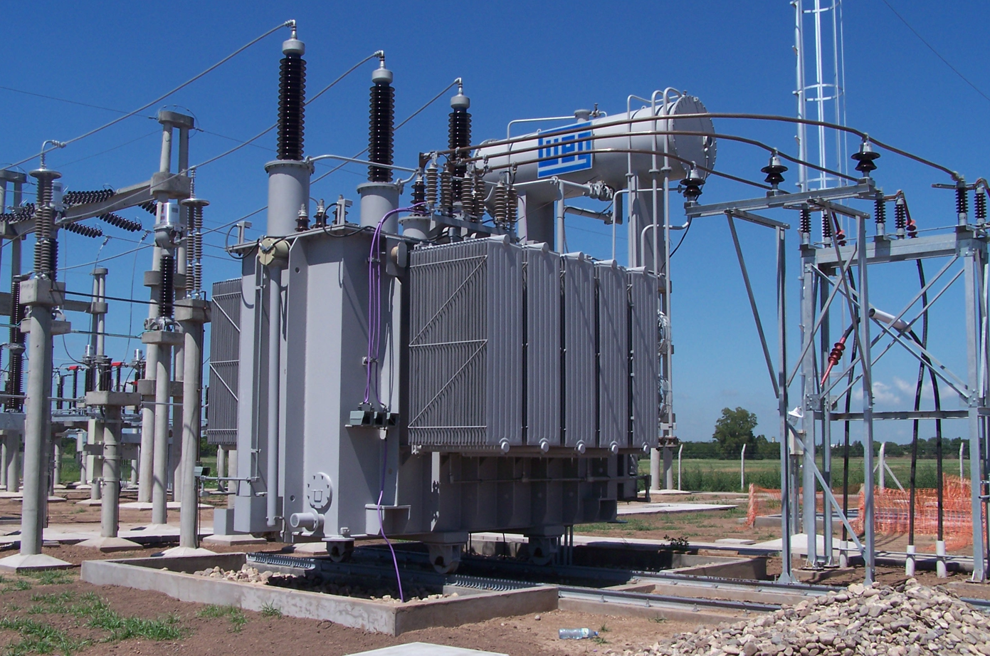 A heavy-duty transformer operates in a Canadian outdoor industrial site, built to withstand harsh environmental conditions