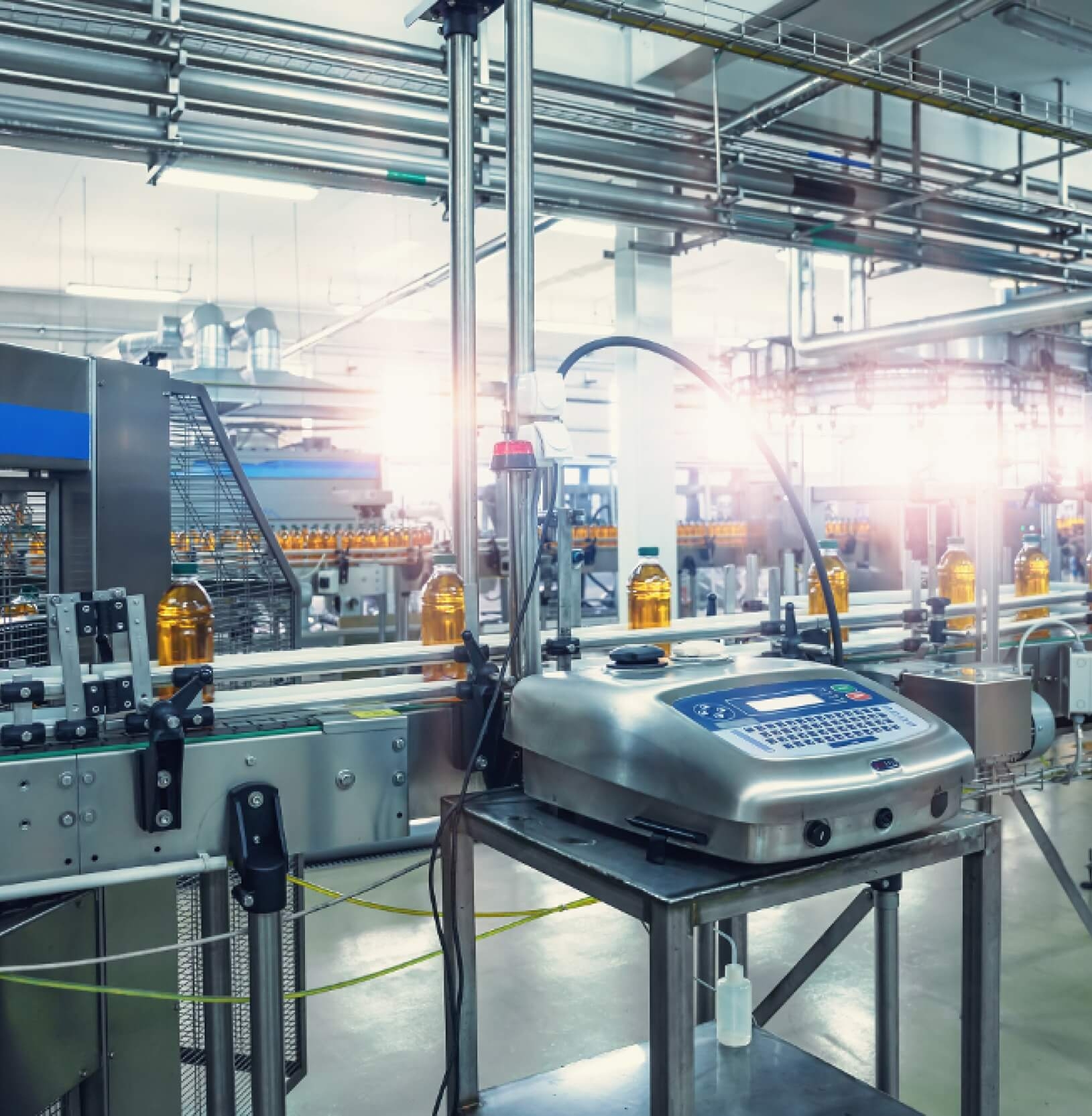 Automated bottling line at beverage processing plant